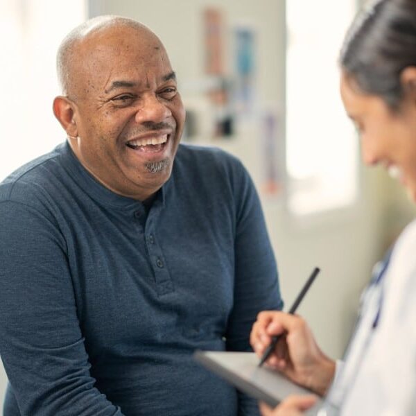 Smiling woman looking at tablet