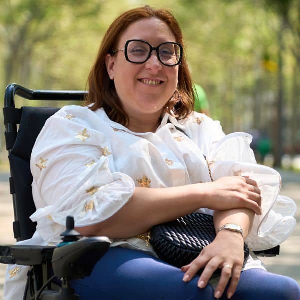 Smiling patient talking to healthcare provider