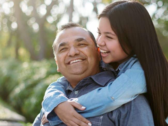 Smiling parent and child